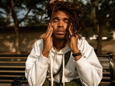 Calm face of a person meditating in sunlight