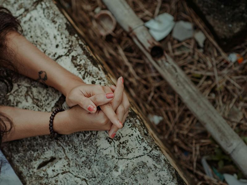 Detail of hands in a meditative pose